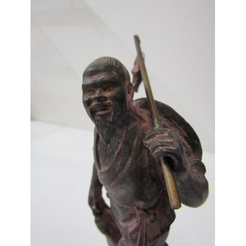 42 - ORIENTAL CARVINGS, a vintage Chinese carved wooden statue depicting a sage, such as Shou Xing, in th... 