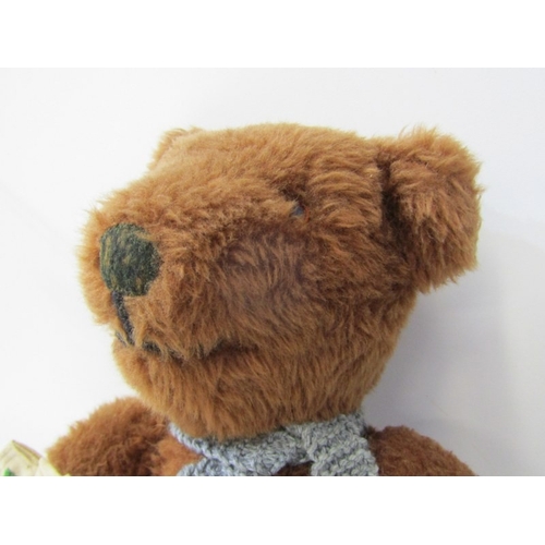 43 - TEDDY BEARS, a teddy bear with cinnamon brown body, stitched black nose and mouth with growler, carr... 