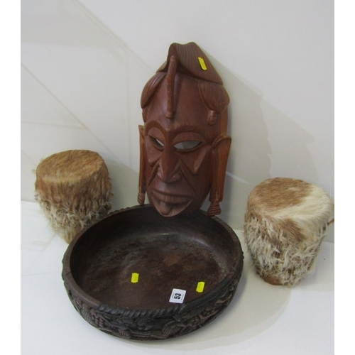 53 - ETHNIC CARVINGS, collection of carved wood animals including rhinos and elephants, ethnic masks and ... 