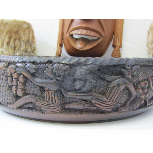 53 - ETHNIC CARVINGS, collection of carved wood animals including rhinos and elephants, ethnic masks and ... 