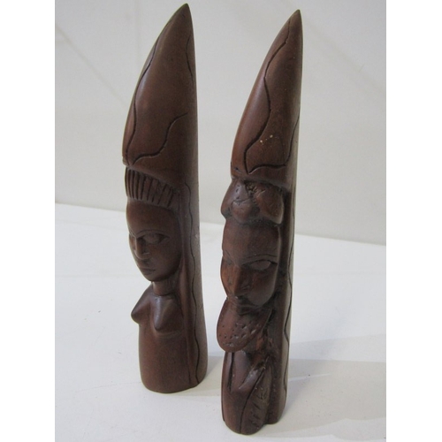 53 - ETHNIC CARVINGS, collection of carved wood animals including rhinos and elephants, ethnic masks and ... 