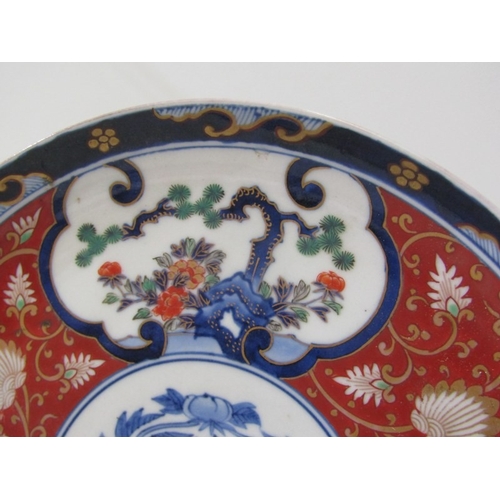 57 - ORIENTAL CERAMICS, a pair of floral decorated Imari pattern plates, both bearing 6 character reign m... 