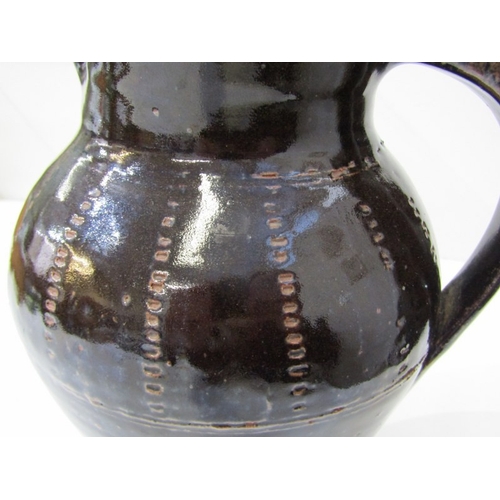 59 - WENFORD BRIDGE POTTERY, a Wenford Bridge pottery jug, the dark brown glaze with impressed dotted lin... 