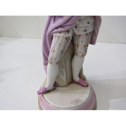 9 - ROYAL DUX, a Royal Dux Bohemia porcelain figure depicting a maiden with a water jug sitting on a lar... 