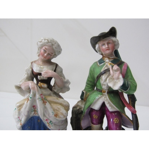 9 - ROYAL DUX, a Royal Dux Bohemia porcelain figure depicting a maiden with a water jug sitting on a lar... 