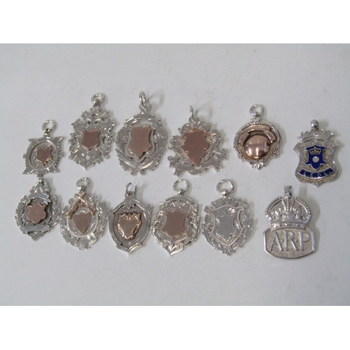 22 - SILVER FOB MEDALLIONS, collection of 12 silver fob medallions, 8 with gold inlaid centres, various d... 