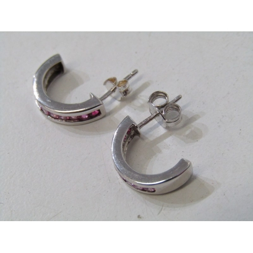 28 - WHITE GOLD & PINK SAPPHIRE EARRINGS, pair of 9ct white gold earrings with channel set pink sapphires... 