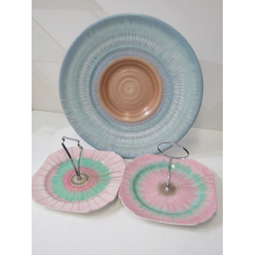 321 - SHELLEY POTTERY, a large Shelley Art Deco shallow dish, central brown and cream ground surrounded by... 