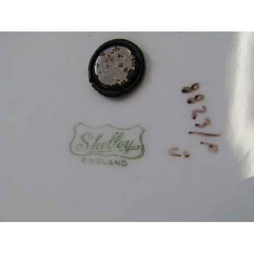 321 - SHELLEY POTTERY, a large Shelley Art Deco shallow dish, central brown and cream ground surrounded by... 