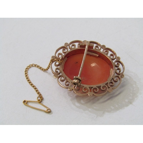 33 - CAMEO BROOCH IN ORNATE FRAME, classical oval cameo brooch in the form of a maiden in an ornate 9ct y... 