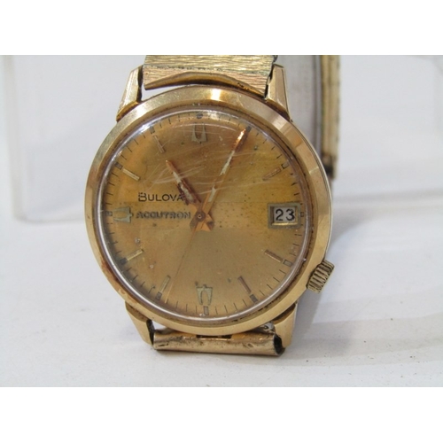 36 - GENTS GOLD WRIST WATCH, Bulova Accutron 18ct gold cased wrist watch with date aperture, on plated st... 