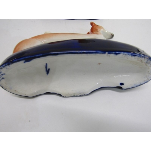368 - STAFFORDSHIRE GREYHOUND INKWELLS, a pair of 19th century Staffordshire pottery greyhound inkwells, b... 