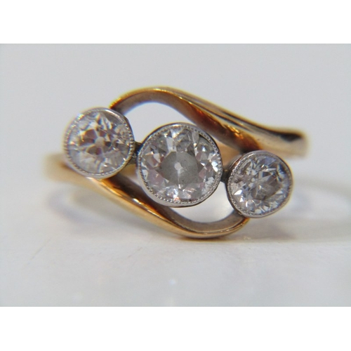 38 - 3 STONE DIAMOND RING, 18ct yellow gold ring, set 3 graduated round brilliant cut diamonds in a cross... 