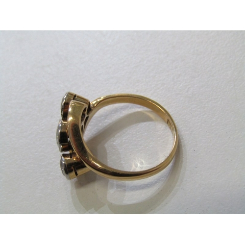 38 - 3 STONE DIAMOND RING, 18ct yellow gold ring, set 3 graduated round brilliant cut diamonds in a cross... 