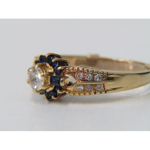 43 - DIAMOND & SAPPHIRE CLUSTER RING, an 18ct yellow gold ring set a central diamond of approx 0.75 ct su... 