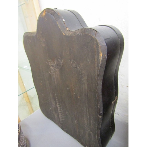 491 - ANTIQUE FRAME, an ornate gilt wood frame of Rococo design with floral borders and top bird motif (da... 