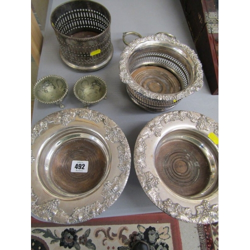 492 - SILVER PLATED COASTERS, a pair of vintage silverplated coasters, each with grape and leaf decoration... 