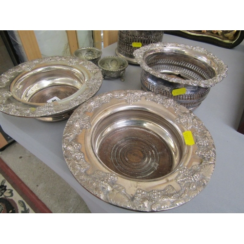 492 - SILVER PLATED COASTERS, a pair of vintage silverplated coasters, each with grape and leaf decoration... 