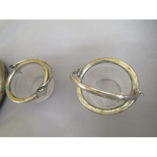 492 - SILVER PLATED COASTERS, a pair of vintage silverplated coasters, each with grape and leaf decoration... 