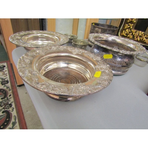 492 - SILVER PLATED COASTERS, a pair of vintage silverplated coasters, each with grape and leaf decoration... 