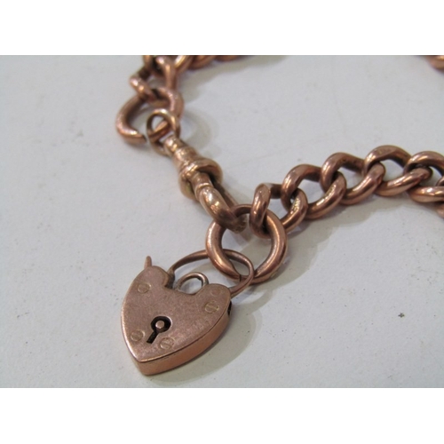 56 - HEAVY GOLD CURB LINK BRACELET, 9ct rose gold curb link watch chain bracelet with padlock clasp, 24.2... 
