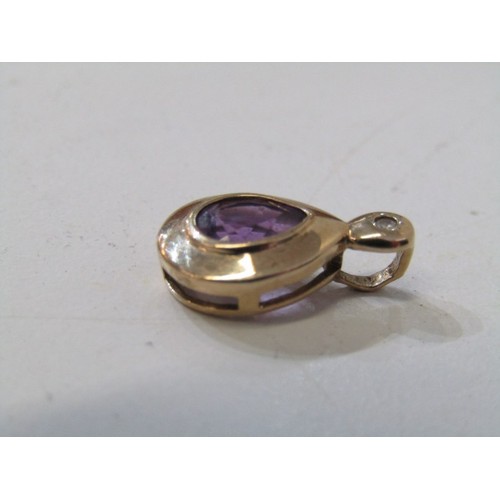 52 - GOLD FRAMED PENDANTS, 2x 9ct gold stone set pendants, 1 set amethyst, other red stone 1.9 grams