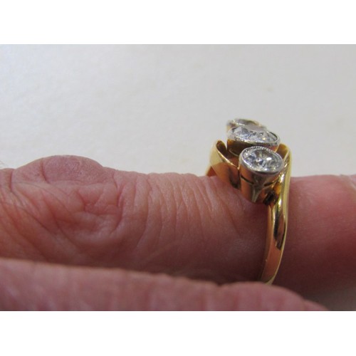 38 - 3 STONE DIAMOND RING, 18ct yellow gold ring, set 3 graduated round brilliant cut diamonds in a cross... 