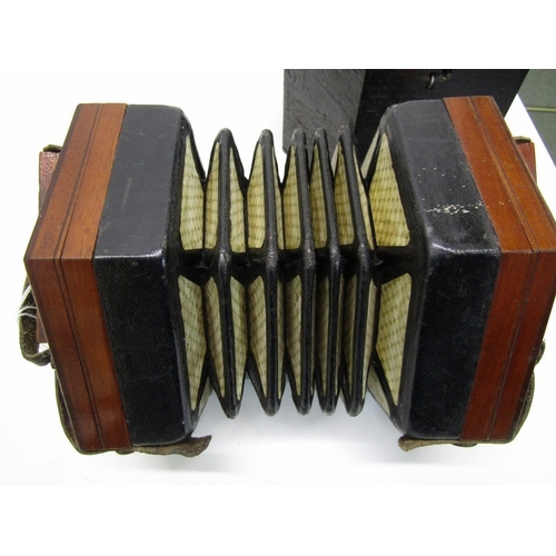 43 - LACHENAL CONCERTINA, a Lachenal & Co 21 button concertina with decorative fretwork end panels, circa... 