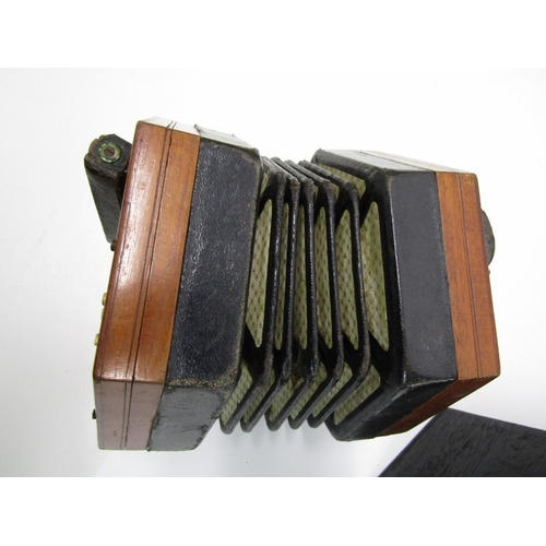 43 - LACHENAL CONCERTINA, a Lachenal & Co 21 button concertina with decorative fretwork end panels, circa... 