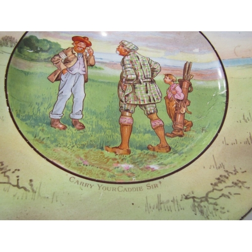 27 - GOLFING, a pottery plate c.1900 depicting a comical   golfing scene, titled 'Carry your Caddy, Sir?'... 