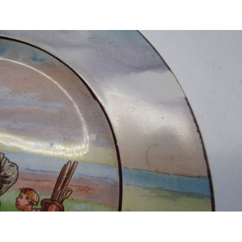 27 - GOLFING, a pottery plate c.1900 depicting a comical   golfing scene, titled 'Carry your Caddy, Sir?'... 