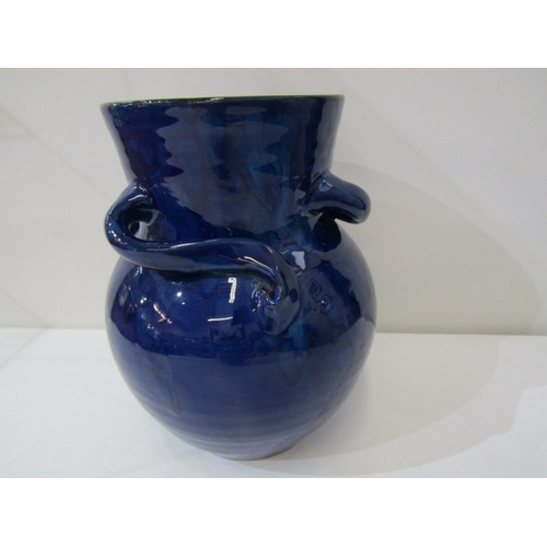 10 - WESUMA POTTERY VASE, a Wesuma (Western Super-Mare) pottery vase with 3 turned handles on a royal blu... 
