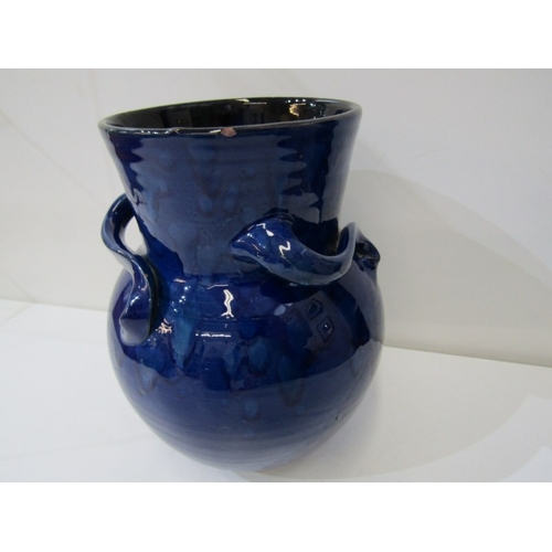 10 - WESUMA POTTERY VASE, a Wesuma (Western Super-Mare) pottery vase with 3 turned handles on a royal blu... 