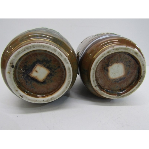 11 - ORIENTAL VASES, a pair of Japanese pottery vases with hand painted figures in relief on a floral and... 
