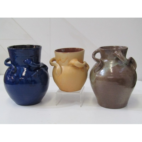 10 - WESUMA POTTERY VASE, a Wesuma (Western Super-Mare) pottery vase with 3 turned handles on a royal blu... 