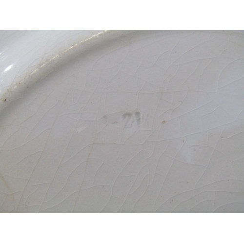 27 - GOLFING, a pottery plate c.1900 depicting a comical   golfing scene, titled 'Carry your Caddy, Sir?'... 