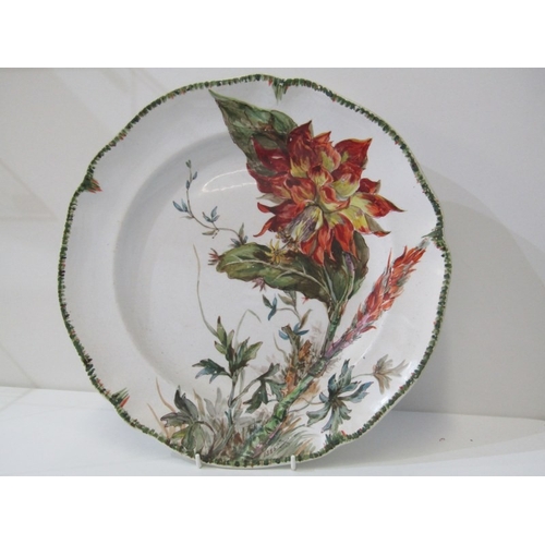 31 - FRENCH POTTERY CHARGER,  a floral decorated French charger by 