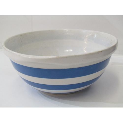 33 - CORNISH KITCHEN WARE, a Cornish blue and white banded mixing bowl with green shield mark to base, 26... 