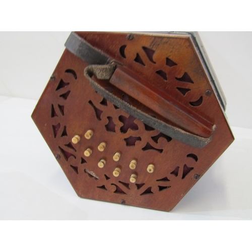 43 - LACHENAL CONCERTINA, a Lachenal & Co 21 button concertina with decorative fretwork end panels, circa... 