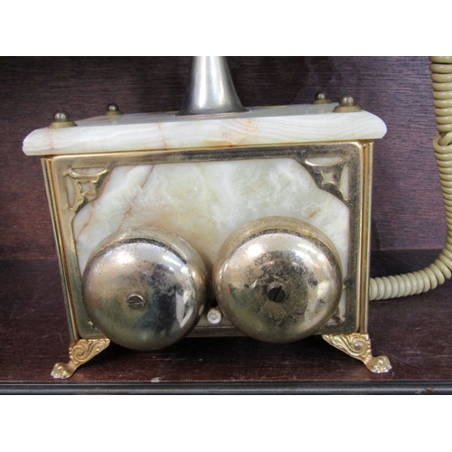 51 - ROTARY DIAL TELEPHONE, an antique style onyx and brass rotary dial telephone, 25cm height