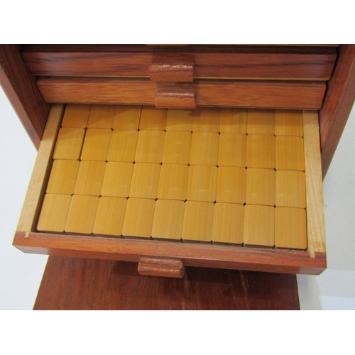 53 - MAH JONG SET, a vintage mah jong set, pieces and strips contained in 5 wooden drawers, in a wood and... 