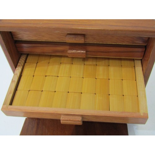 53 - MAH JONG SET, a vintage mah jong set, pieces and strips contained in 5 wooden drawers, in a wood and... 