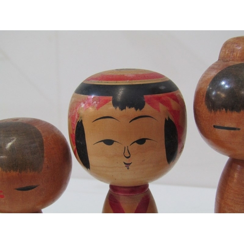 5 - KOKESHI WOODEN DOLLS, collection of 5 assorted Kokeshi doll figures, tallest 30cm, another in red fa... 