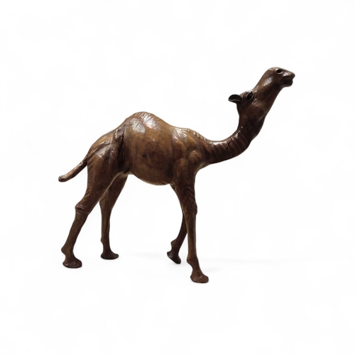 Liberty of London Leather Model of a Camel, in walking gate, head to the sky.  34cm to highest point.
