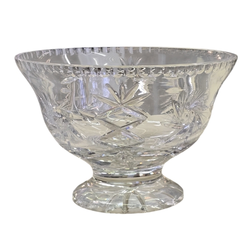 71 - A substantial cut crystal footed centrepiece bowl, with hobstar, fan and diamond cut decoration, rai... 