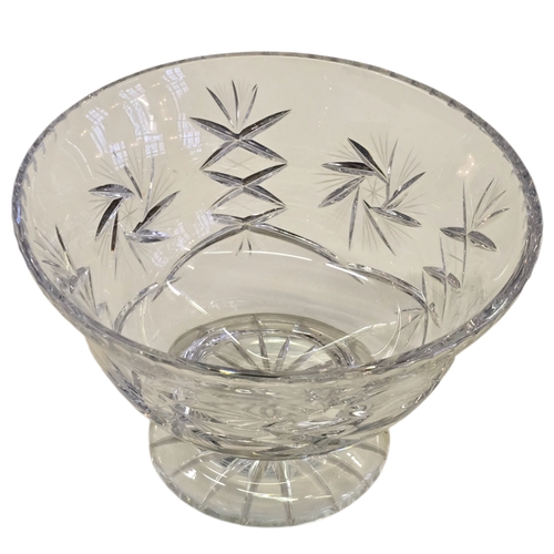 71 - A substantial cut crystal footed centrepiece bowl, with hobstar, fan and diamond cut decoration, rai... 