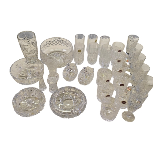 340 - large collection of cut crystal and cut glass, including English and French examples,
comprising dri... 