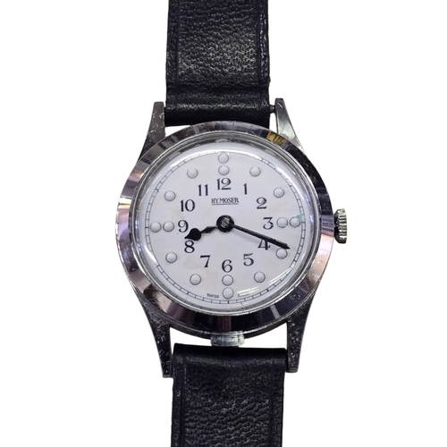 6 - A Henri Moser Swiss Braille wristwatch, circa 1960s–70s, the white dial with Arabic numerals and rai... 