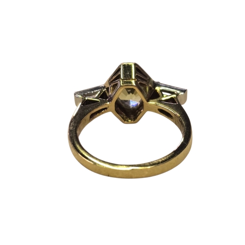 14 - An Art Deco Style 18ct Gold Green Sapphire and Diamond Ring, Set with an elongated hexagonal-cut gre... 