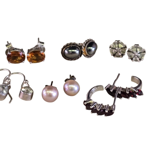 17 - Collection of 925 Silver Gem-Set EarringsA collection of fourteen pairs of 925 silver gem-set earrin... 